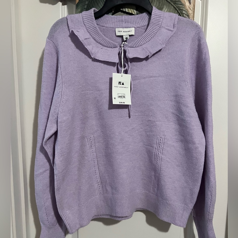 *SOLD*Free assembly lavender sweater sz L